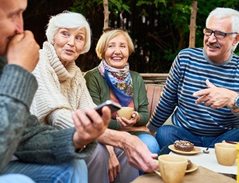 Group of senior friends enjoying a conversation