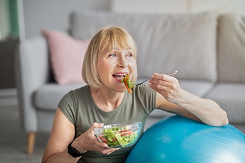 Woman eating a salad