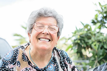 Woman smiling with dentures