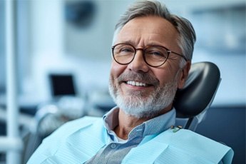 : man smiling in the dentist chair