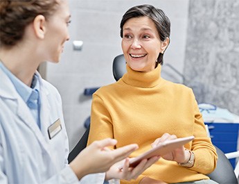 Smiling woman talking during a consultation