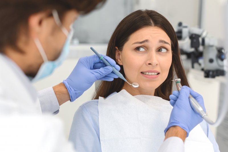 woman fearful of the dentist